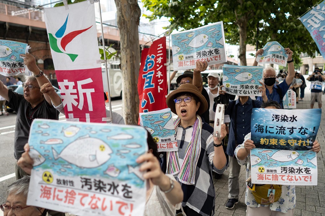 Japan begins discharging nuclear contaminated water