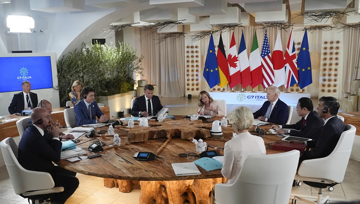 From left, European Council President Charles Michel, German Chancellor Olaf Scholz, Canada's Prime Minister Justin Trudeau, French President Emmanuel Macron, Italian Prime Minister Giorgia Meloni, U.S. President Joe Biden, Japan's Prime Minister Fumio Kishida, Britain's Prime Minister Rishi Sunak and European Commission President Ursula von der Leyen participate in a working session at the G7, Thursday, June 13, 2024, in Borgo Egnazia, Italy.